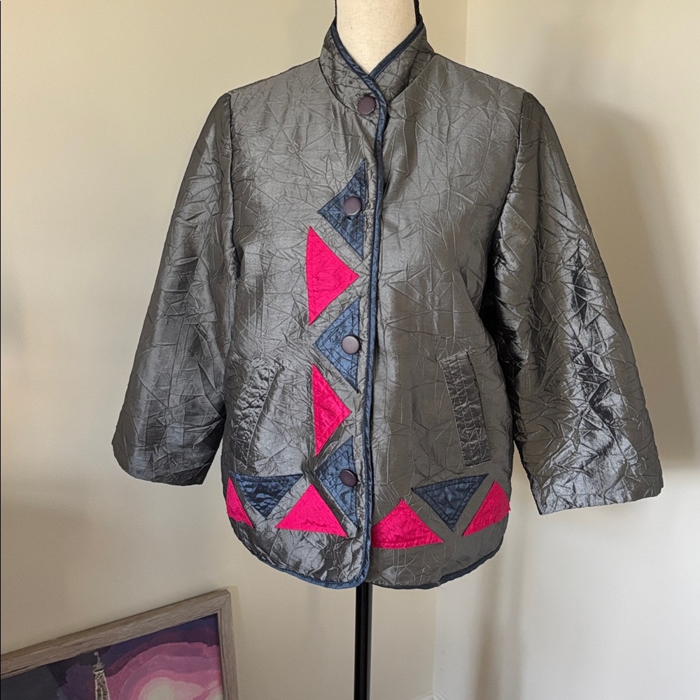 Gray Quilted Jacket with Pink and Blue Accents